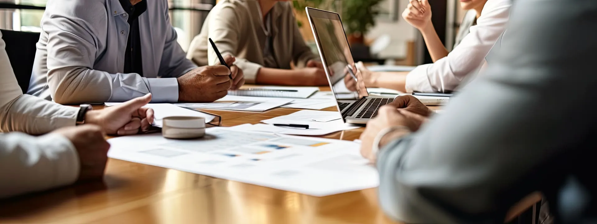 Team reviewing compliance documents at a conference table