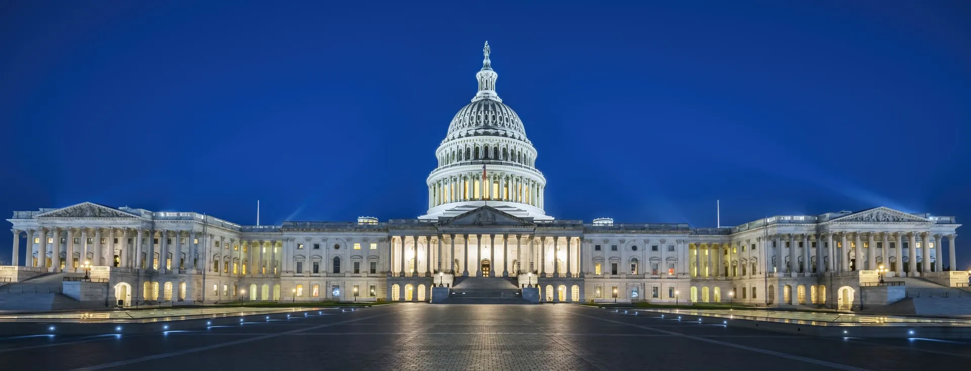 United States Capitol building illuminated at night